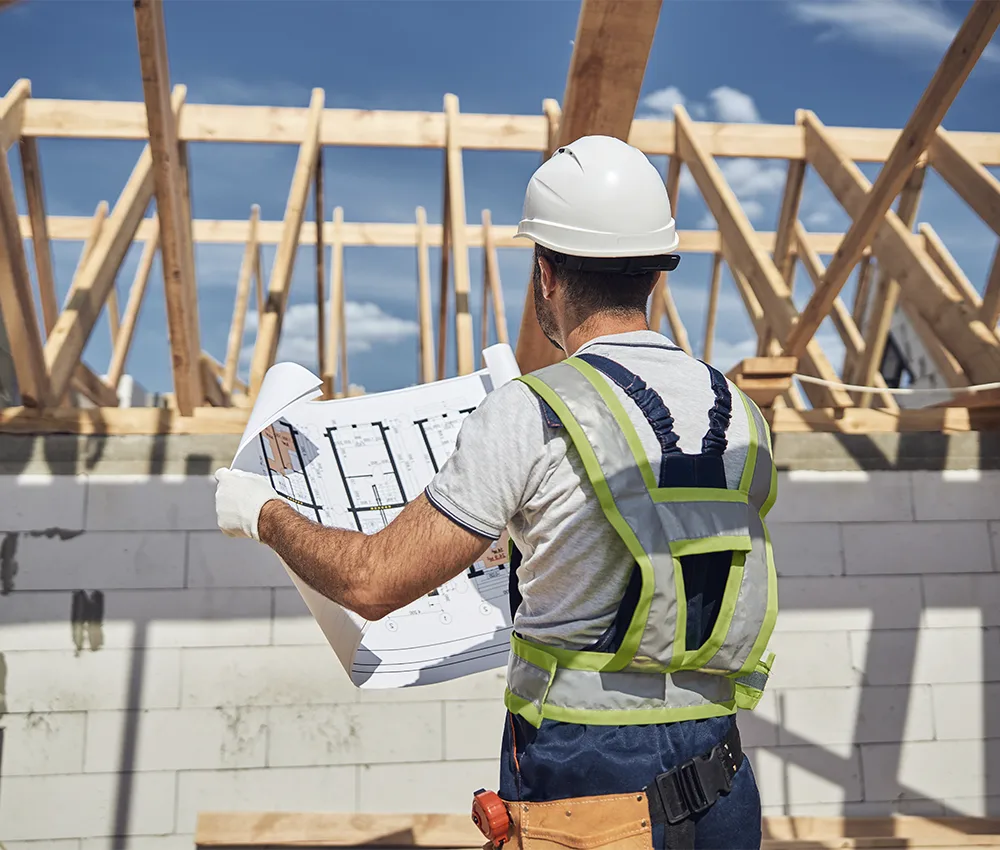 Ifinity Construction team reviewing plans